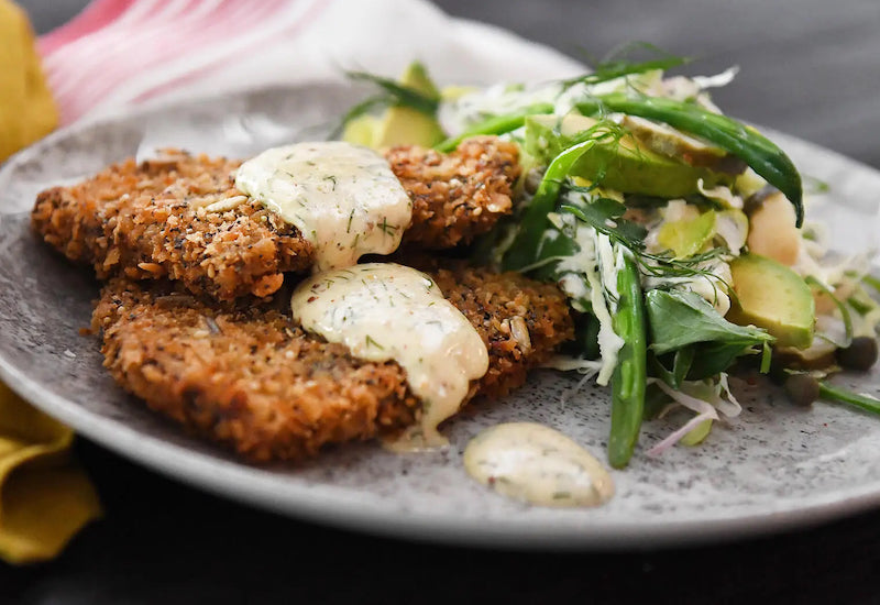 Beef schnitzel with dill and avocado slaw